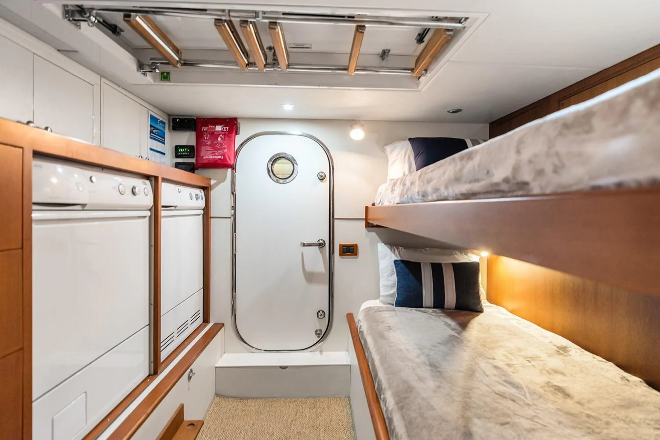 a large kitchen with a large refrigerator aboard ENCORE Yacht for Sale