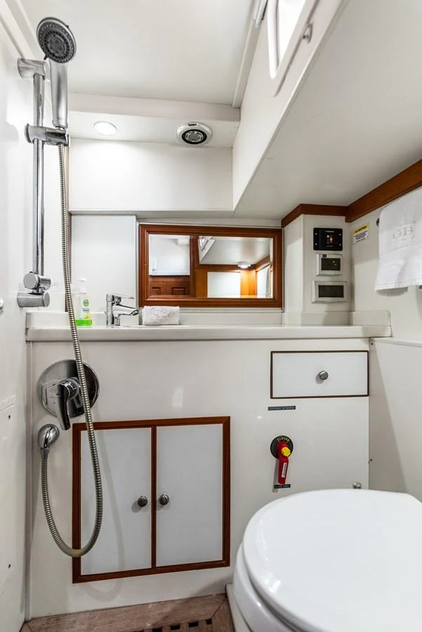 a bathroom with a shower and a sink aboard ENCORE Yacht for Sale