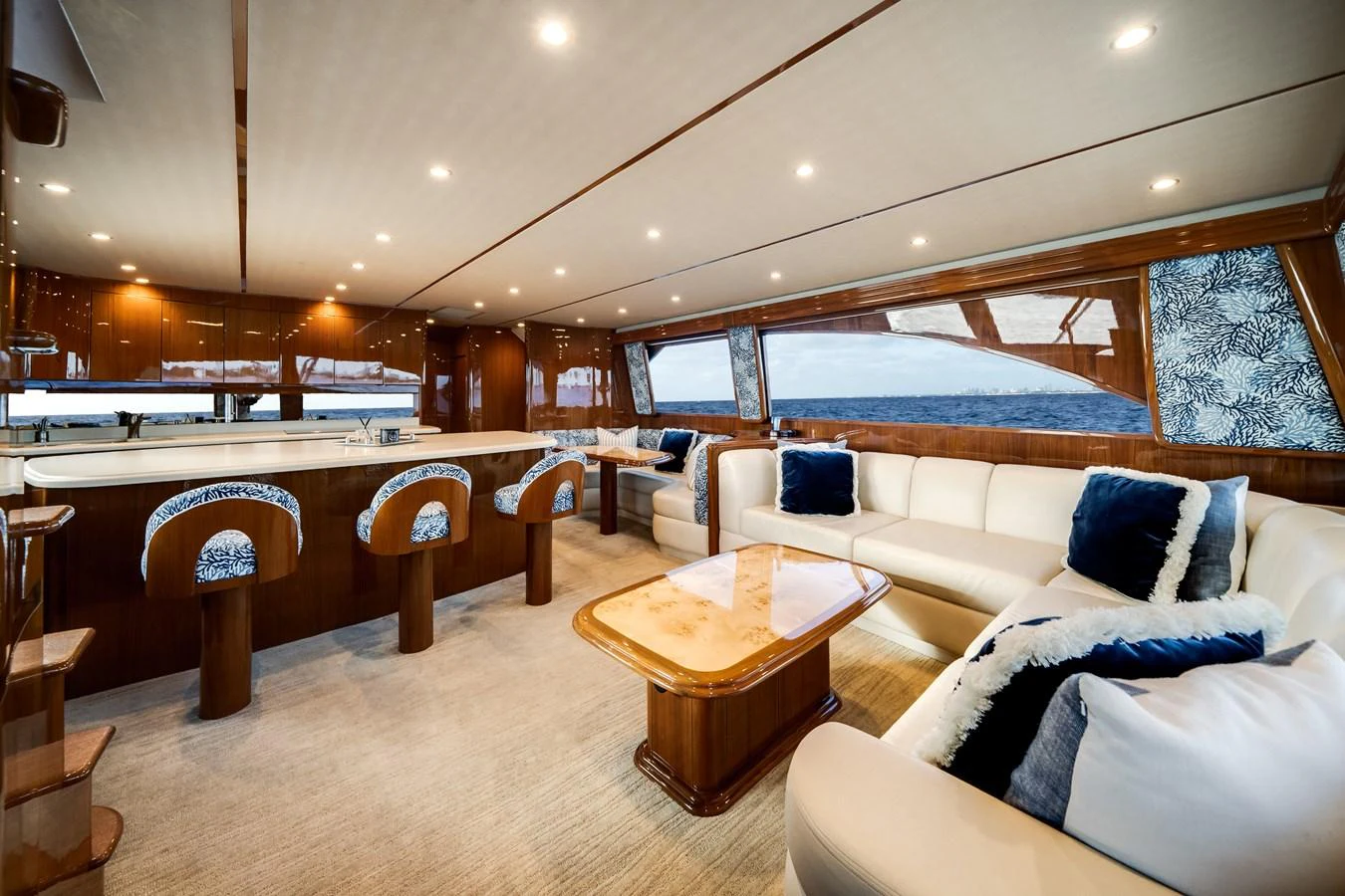 a large living room with a large window aboard EL JEFE Yacht for Sale