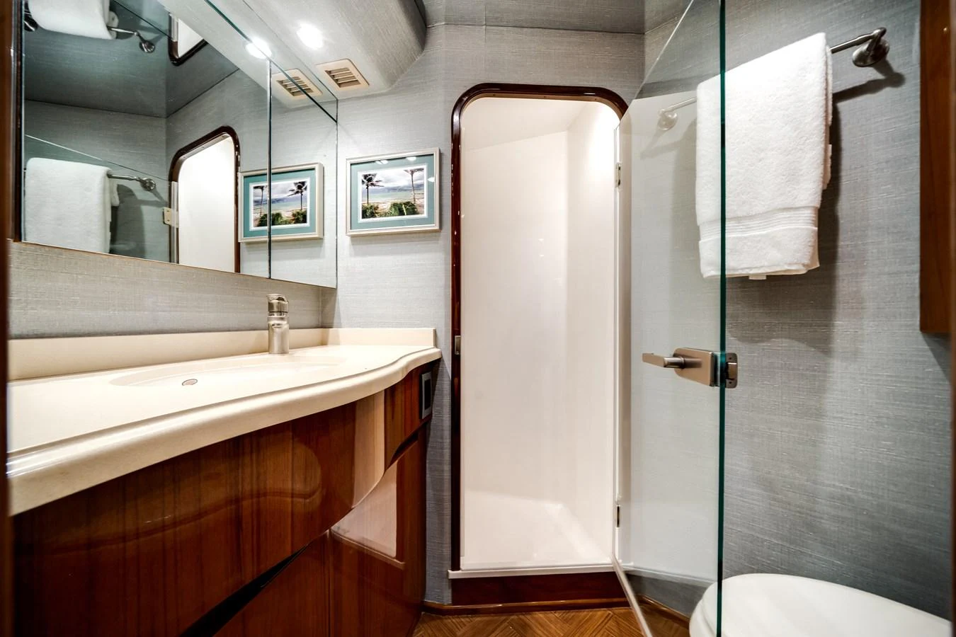 a bathroom with a sink and a mirror aboard EL JEFE Yacht for Sale