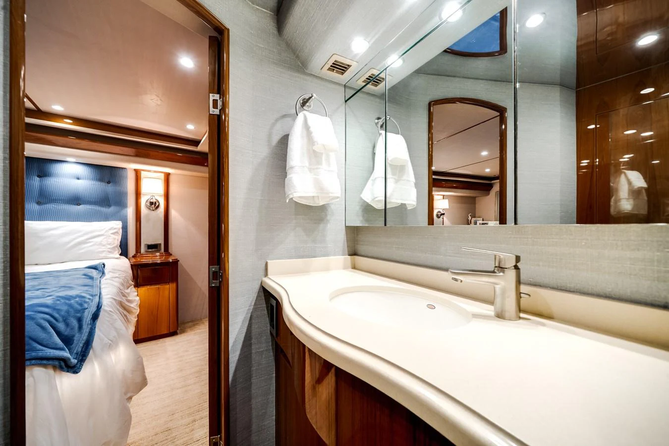 a bathroom with a large mirror aboard EL JEFE Yacht for Sale