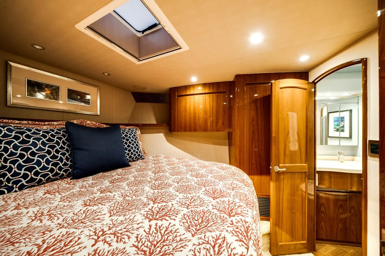 a bedroom with a large bed aboard EL JEFE Yacht for Sale