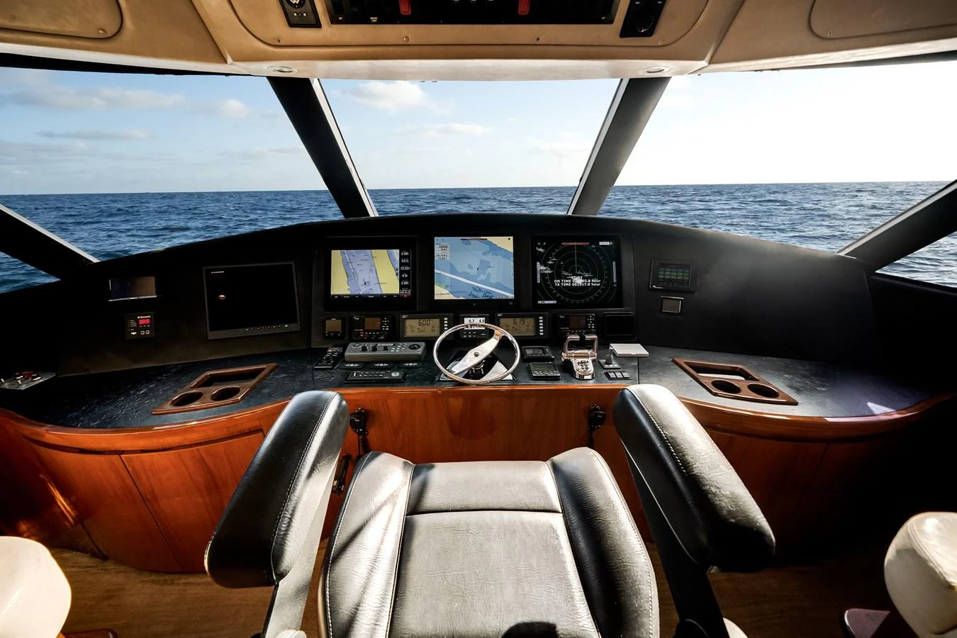 inside of a car aboard EL JEFE Yacht for Sale