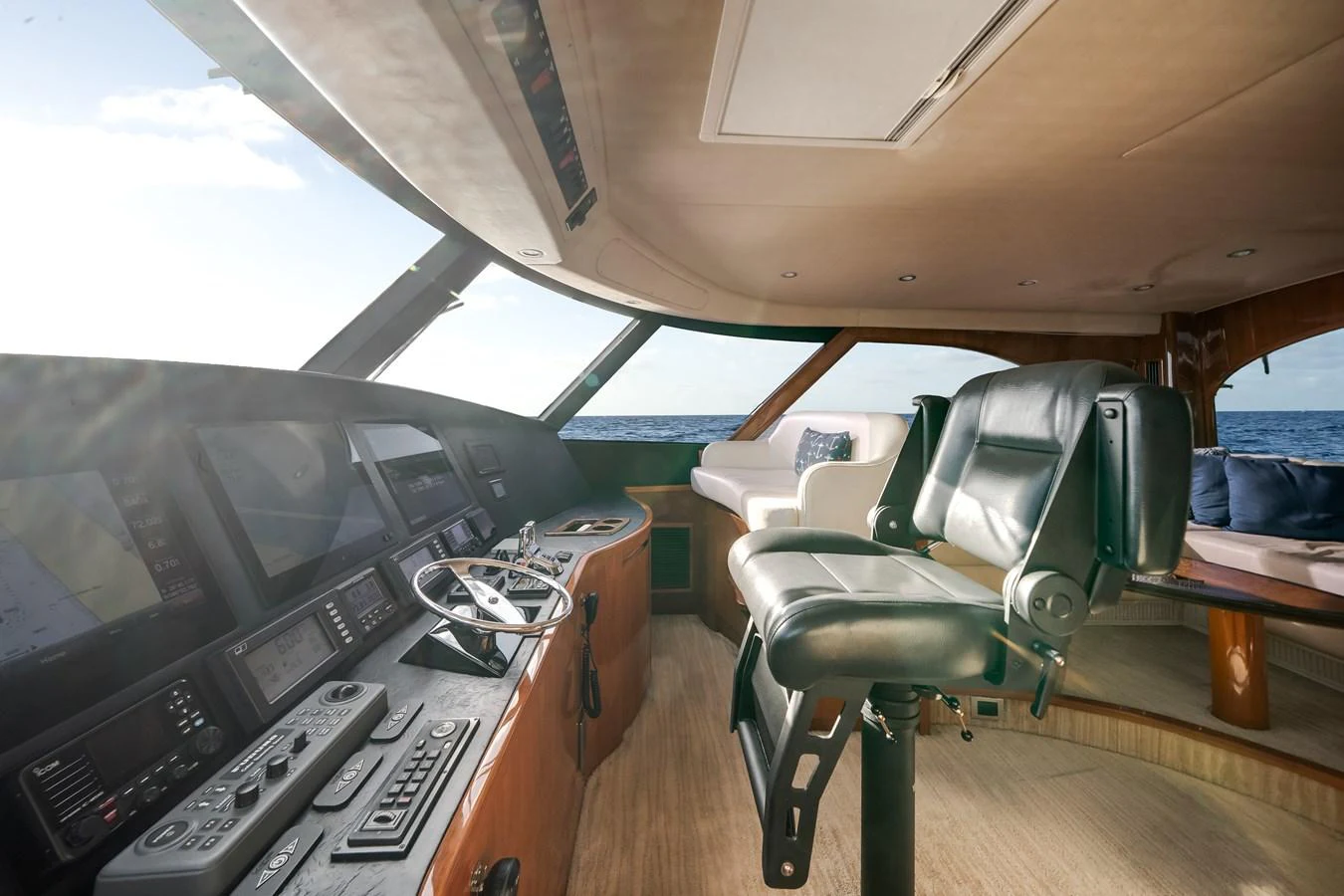 a plane with a desk and chairs aboard EL JEFE Yacht for Sale