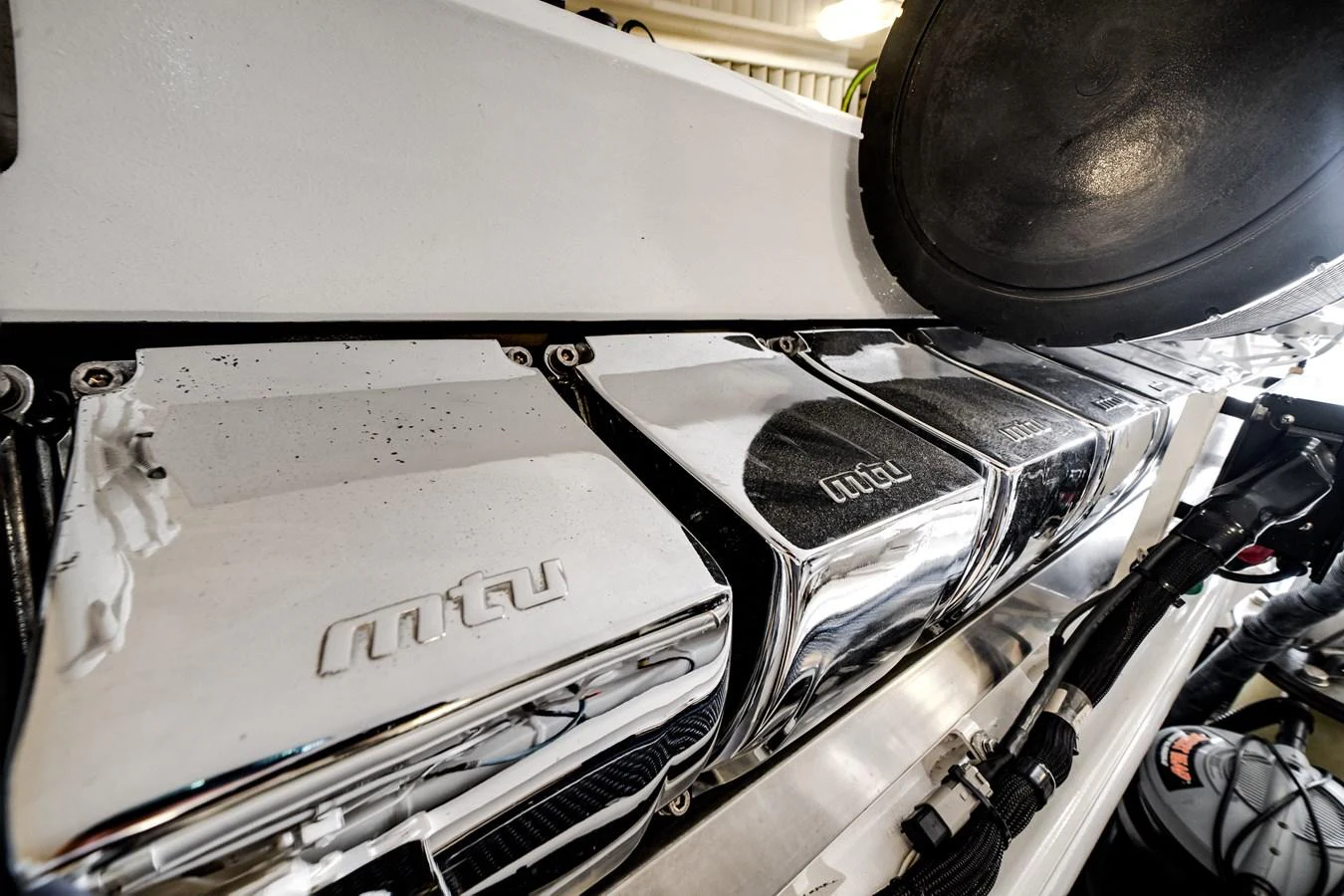 a close-up of a car engine aboard EL JEFE Yacht for Sale
