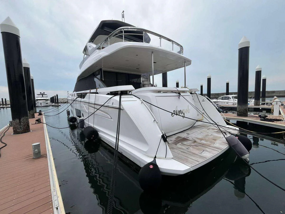 a boat docked at a pier aboard ANGEL Yacht for Sale