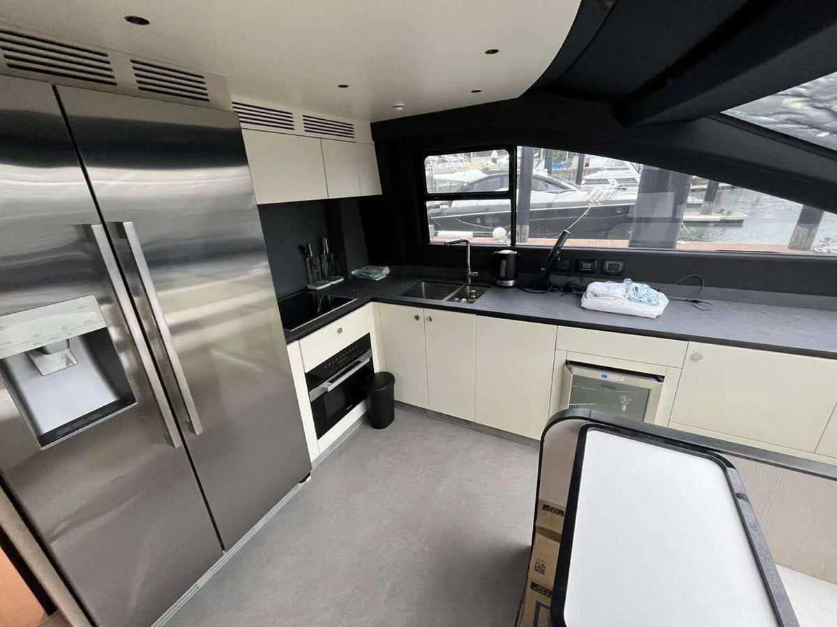 a kitchen with a large window aboard ANGEL Yacht for Sale