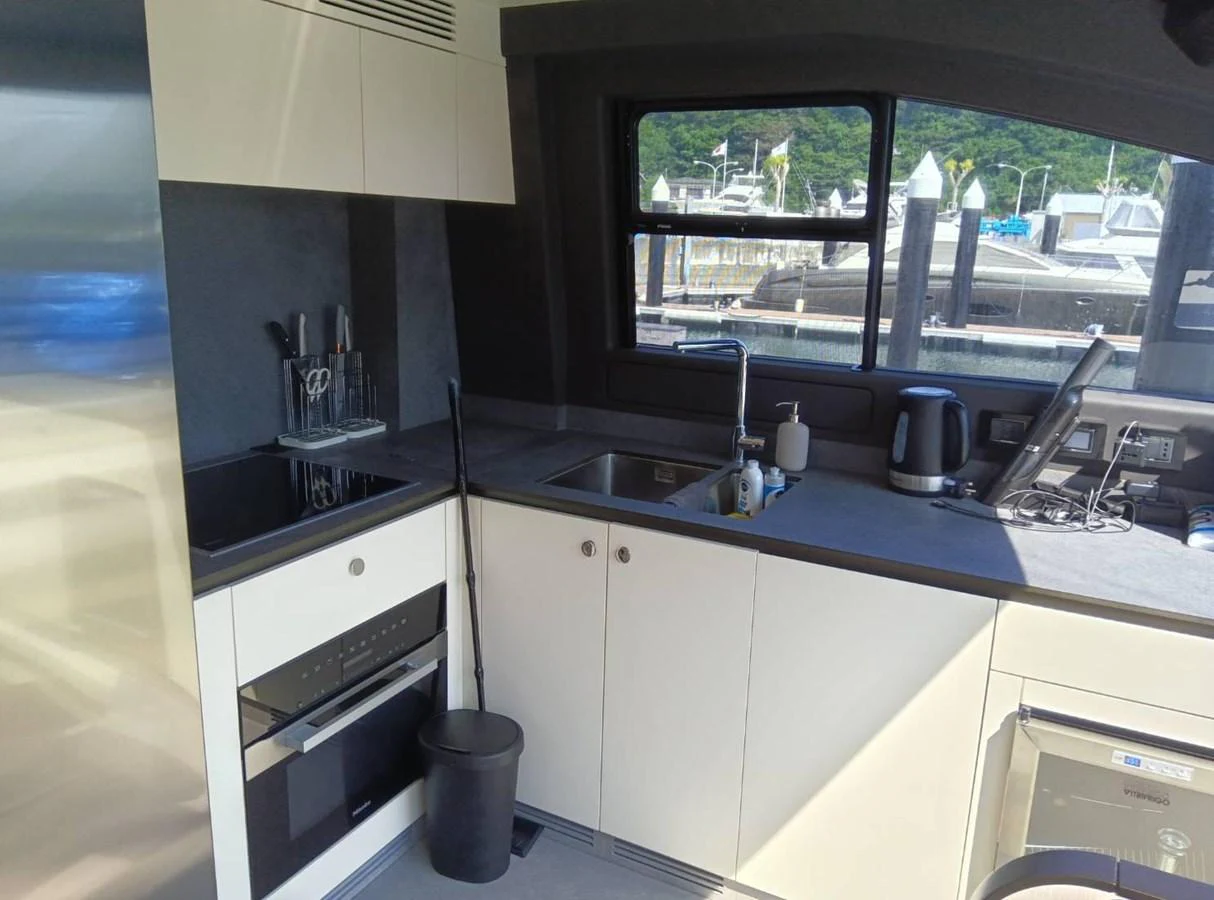 a kitchen with a sink and a window aboard ANGEL Yacht for Sale