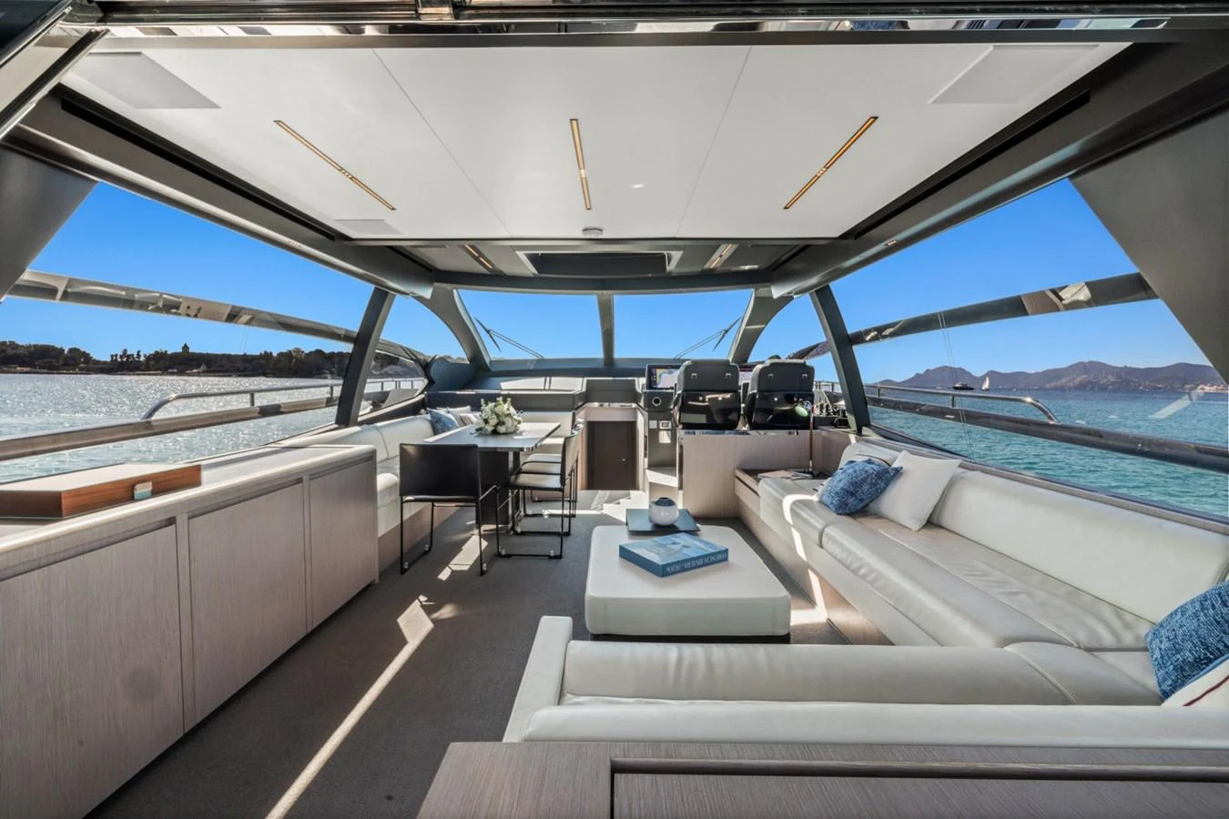 a room with a couch and a pool aboard SAMIRA Yacht for Sale