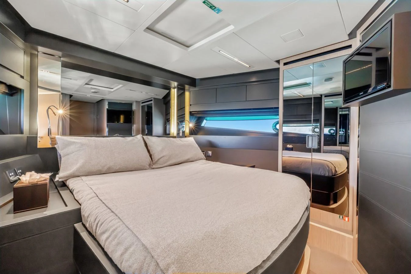 a bed in a room aboard SAMIRA Yacht for Sale