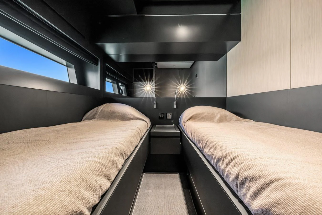 a room with two beds aboard SAMIRA Yacht for Sale