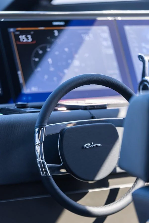 a close-up of a steering wheel aboard SAMIRA Yacht for Sale