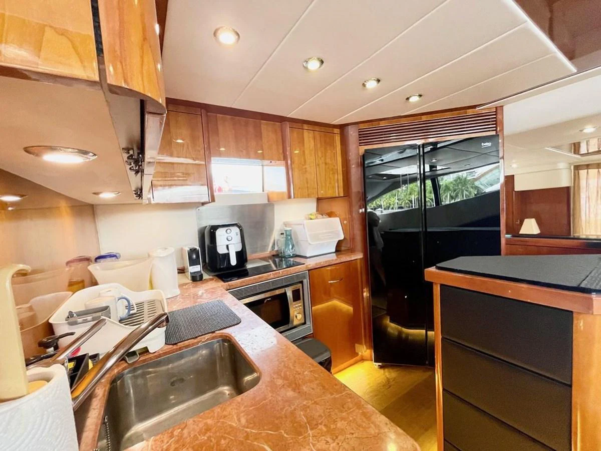 The galley features modern appliances and ample counter space for meal preparation. aboard ELLYN Yacht for Sale