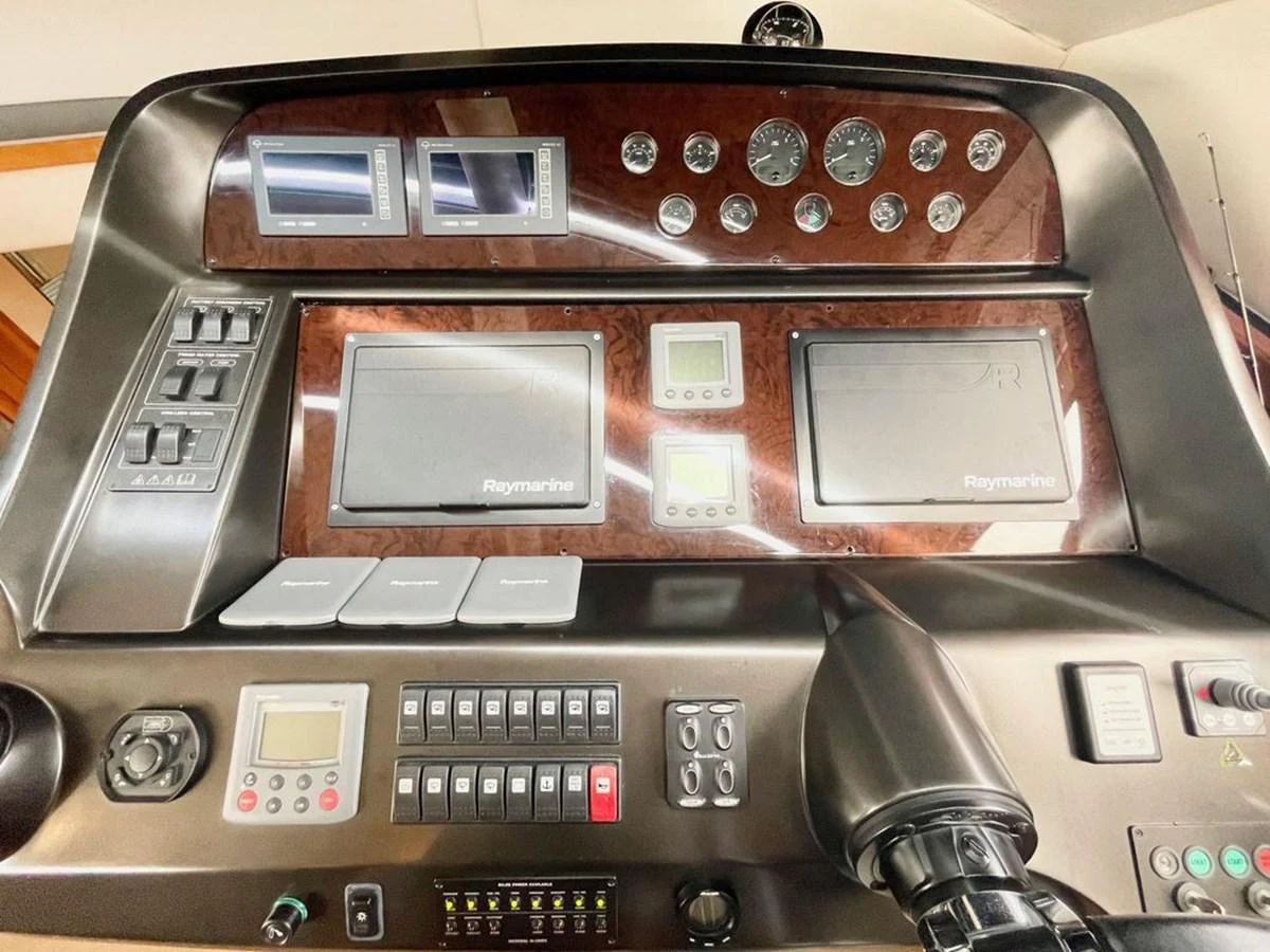 The helm station features advanced navigation and control systems for a seamless sailing experience. aboard ELLYN Yacht for Sale