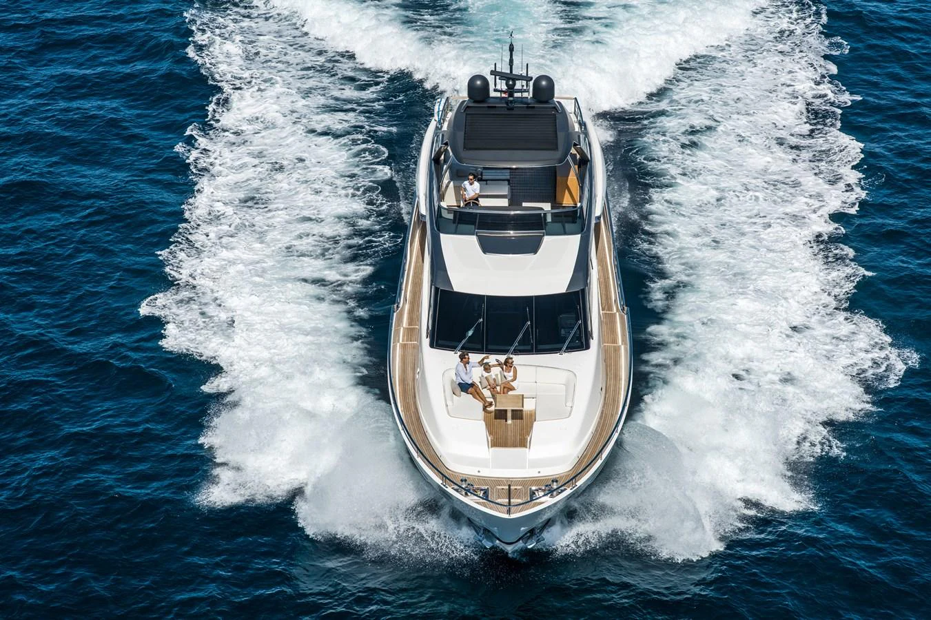 A sleek yacht cruising through the open water, showcasing its powerful performance and luxurious design. aboard ASTRIMARE Yacht for Sale