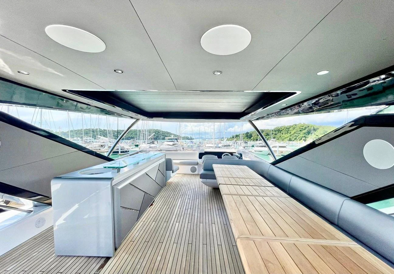 The flybridge offers a spacious and modern area with ample seating and a sleek design. aboard SU Yacht for Sale