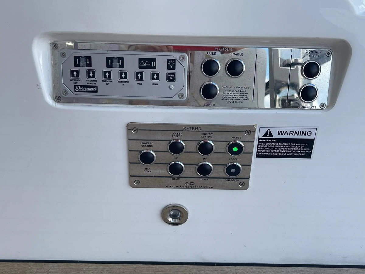 A close-up view of the yacht's control panel showcasing various switches and indicators. aboard SU Yacht for Sale