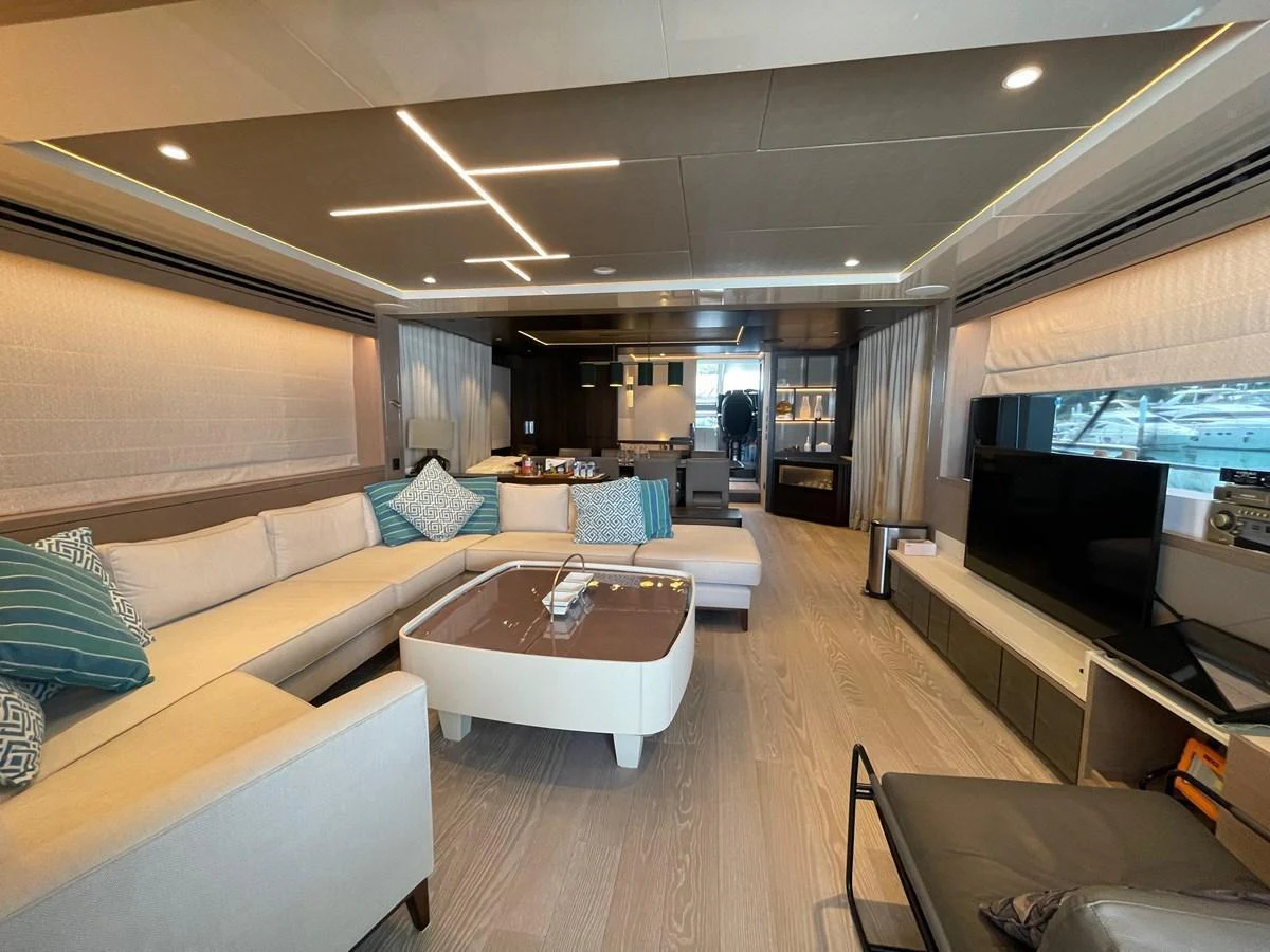 The salon features a spacious and modern design with comfortable seating and elegant decor. aboard SU Yacht for Sale