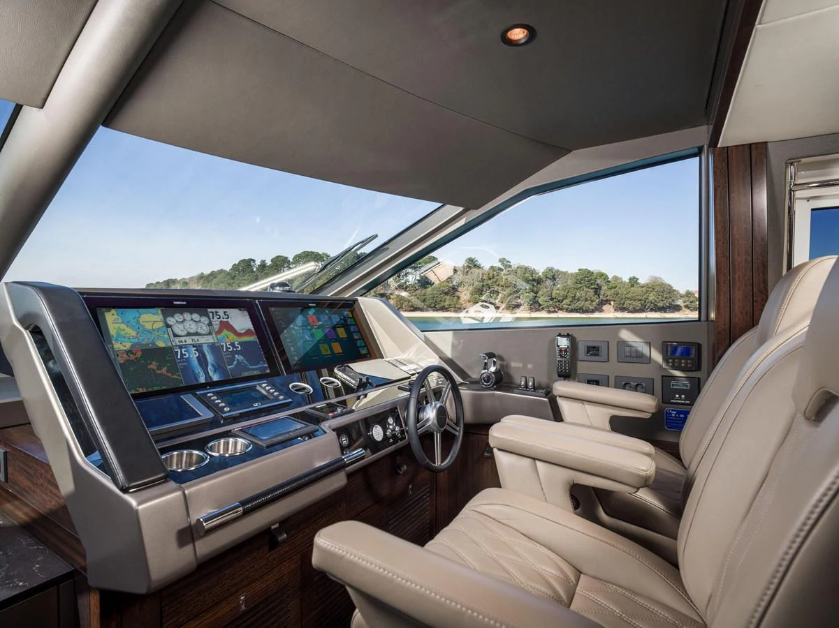 The helm station features advanced navigation equipment and luxurious seating with a panoramic view. aboard SU Yacht for Sale