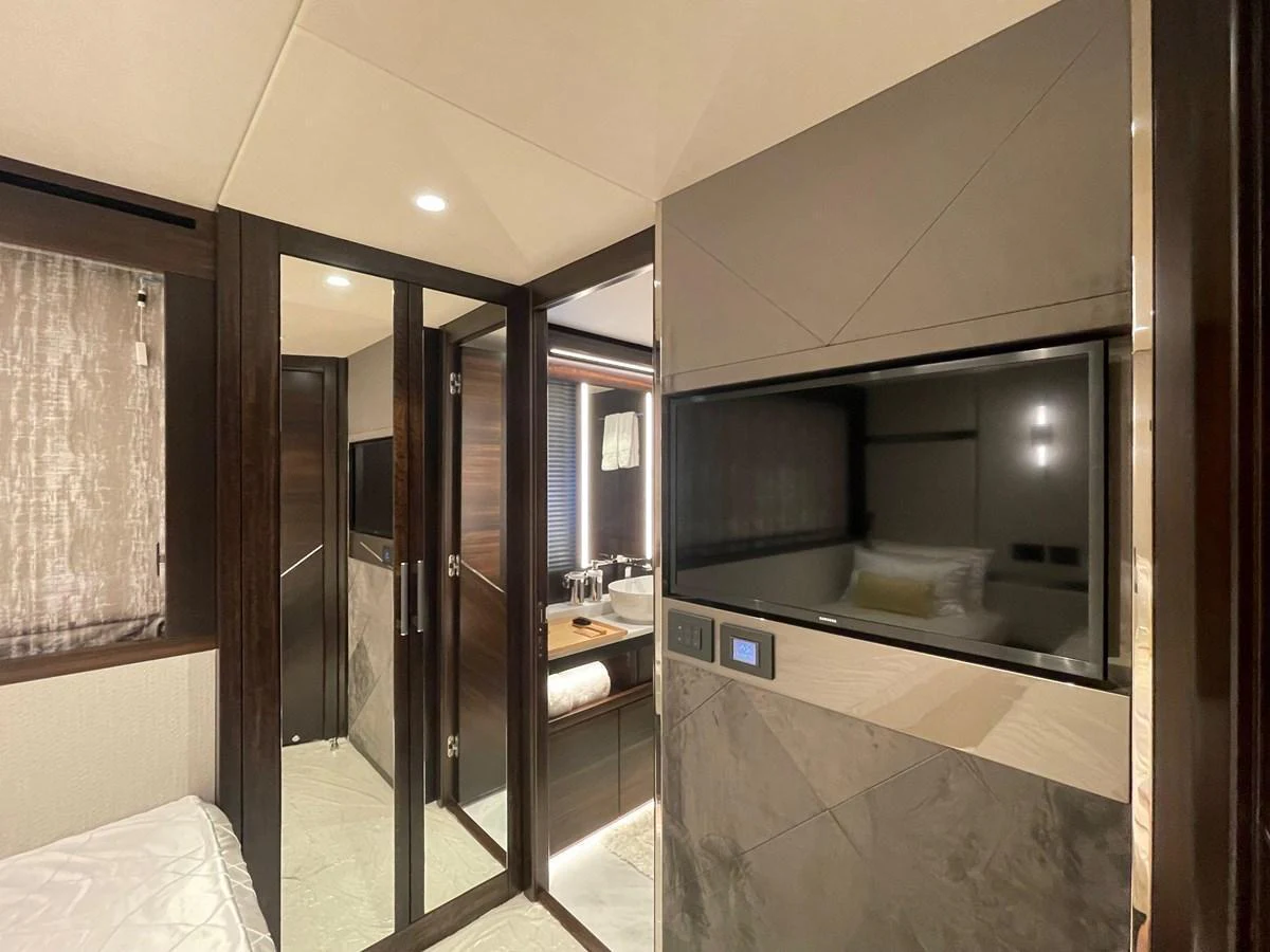 The yacht's interior features a modern and elegant design with a focus on luxury and comfort. aboard SU Yacht for Sale
