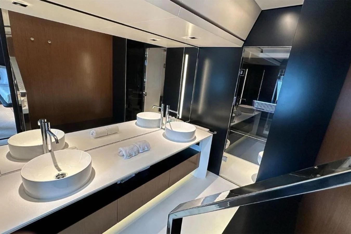 The yacht's bathroom features modern fixtures and a sleek design. aboard BELLA DONNA Yacht for Sale
