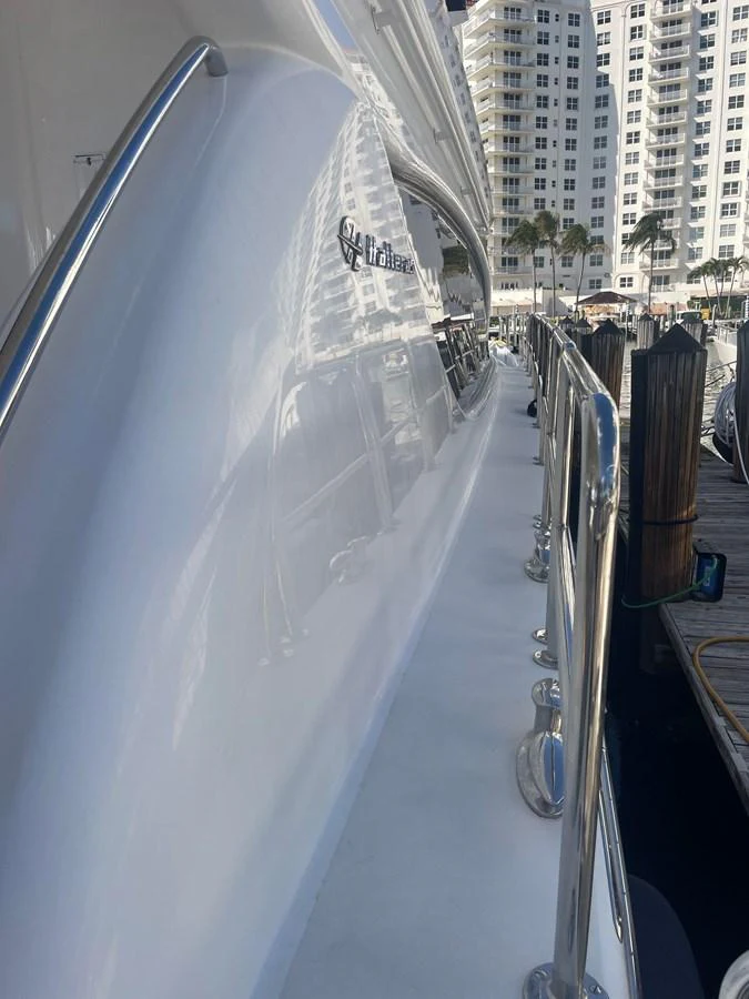A sleek side deck with polished railings and a pristine finish. aboard HOPE Yacht for Sale