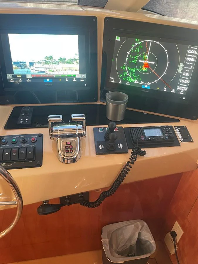 The helm station features advanced navigation and control systems for a seamless yachting experience. aboard HOPE Yacht for Sale