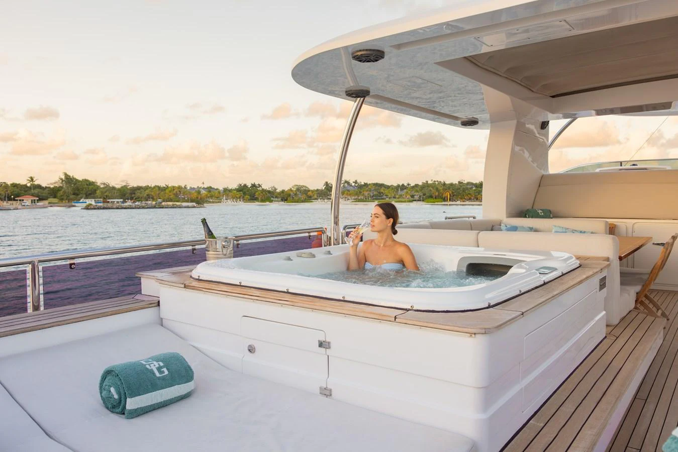 The yacht features a luxurious jacuzzi on the deck, perfect for relaxation with stunning views. aboard SEA GYPSY Yacht for Sale