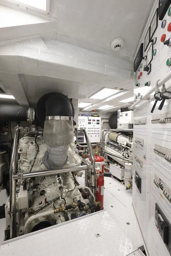 The yacht's engine room showcases advanced machinery and control panels, ensuring optimal performance and safety. aboard SEA GYPSY Yacht for Sale