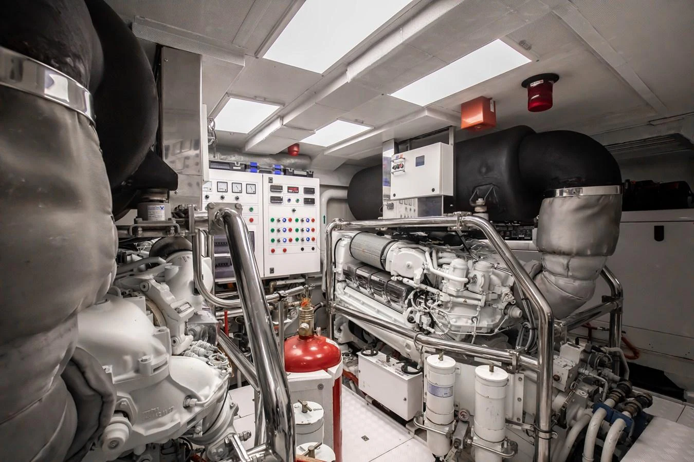 The engine room showcases advanced machinery and control systems, ensuring optimal performance and reliability. aboard SEA GYPSY Yacht for Sale