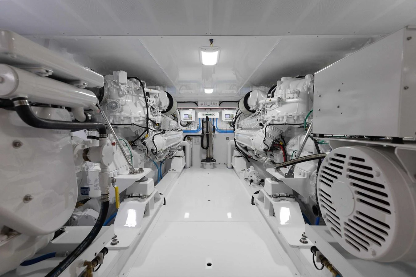 The engine room showcases the yacht's powerful and well-maintained machinery. aboard QUEEN BEE Yacht for Sale