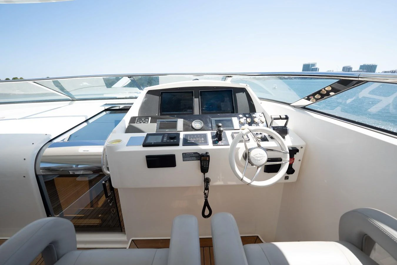 The helm station offers a sleek and modern control area with advanced navigation equipment. aboard BLUE Yacht for Sale