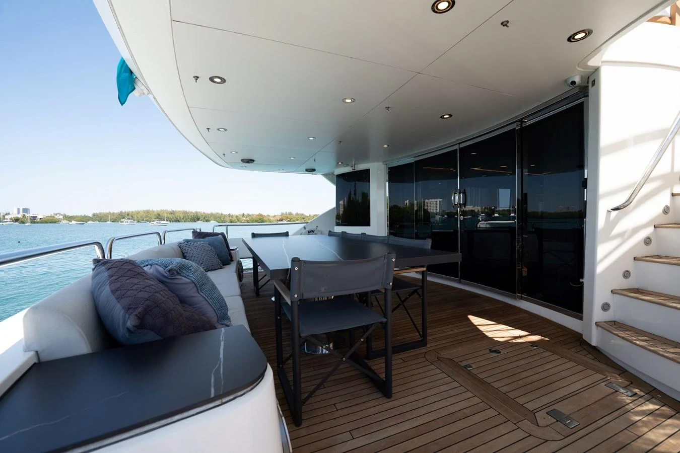 The aft deck offers a spacious and inviting area for outdoor dining and relaxation. aboard BLUE Yacht for Sale