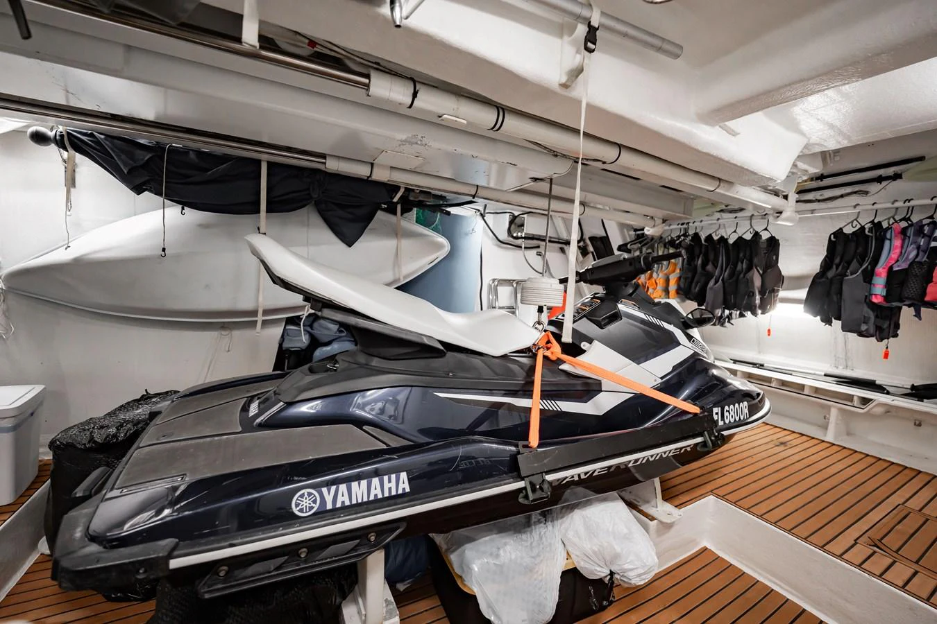 The yacht's garage houses a sleek Yamaha jet ski, ready for thrilling water adventures. aboard BLUE Yacht for Sale