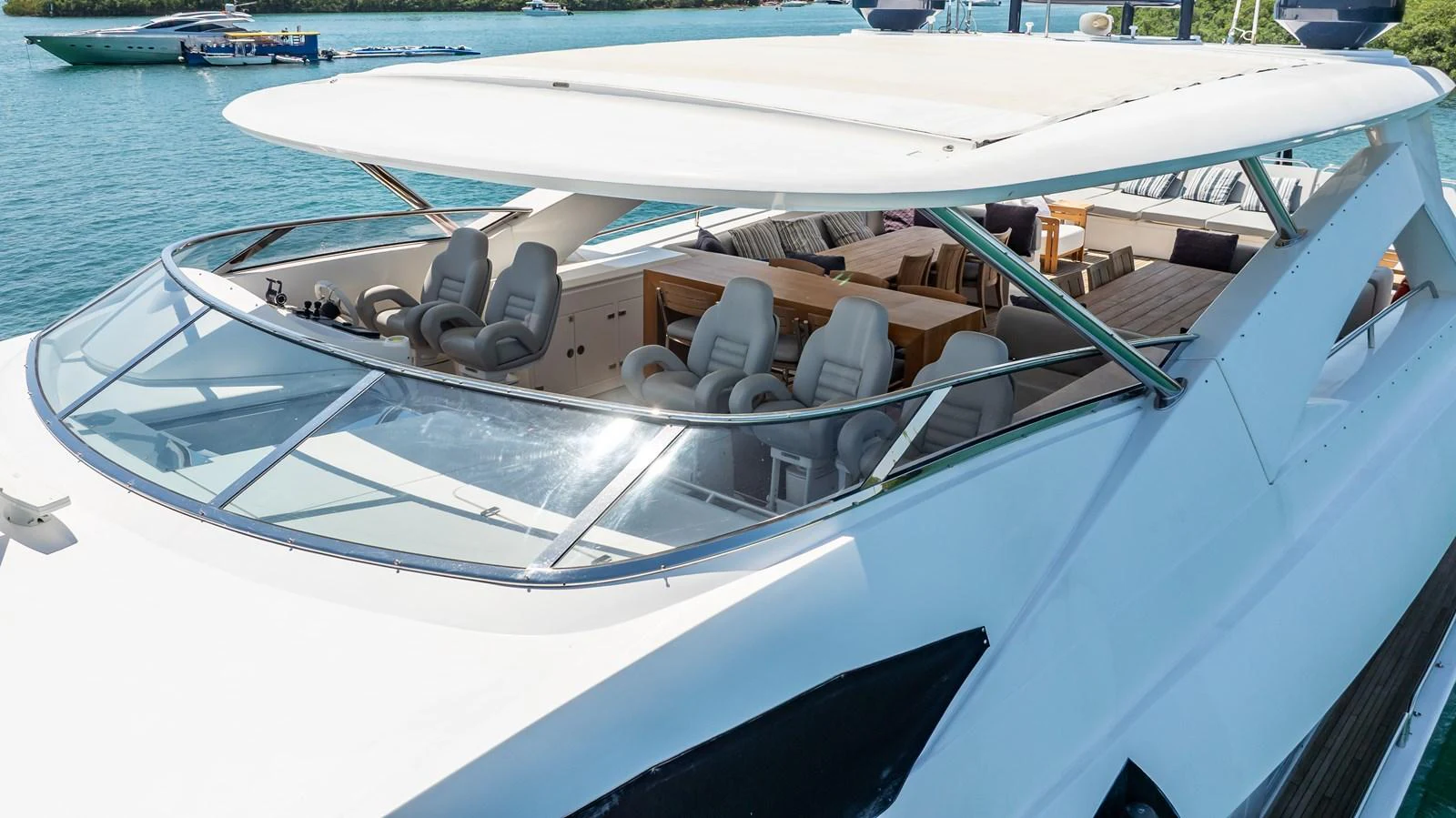 The flybridge of this yacht offers a spacious and luxurious area for relaxation and navigation. aboard BLUE Yacht for Sale