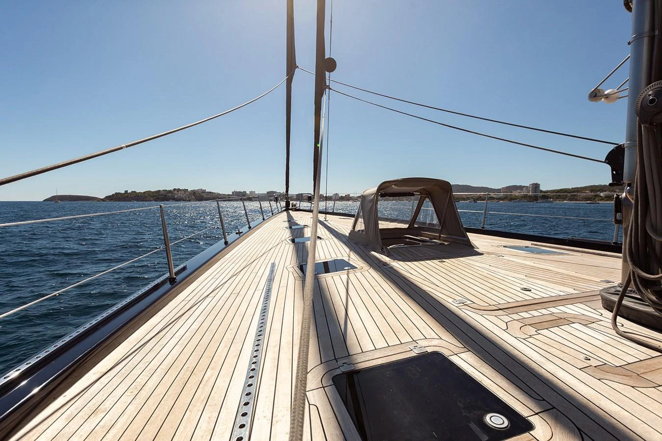 The yacht's deck offers a spacious and elegant area for relaxation and enjoyment under the sun. aboard 4K Yacht for Sale