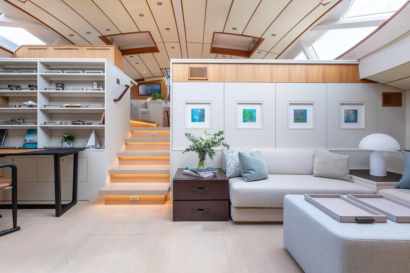 The yacht's salon features a modern and spacious design with comfortable seating and elegant decor. aboard 4K Yacht for Sale