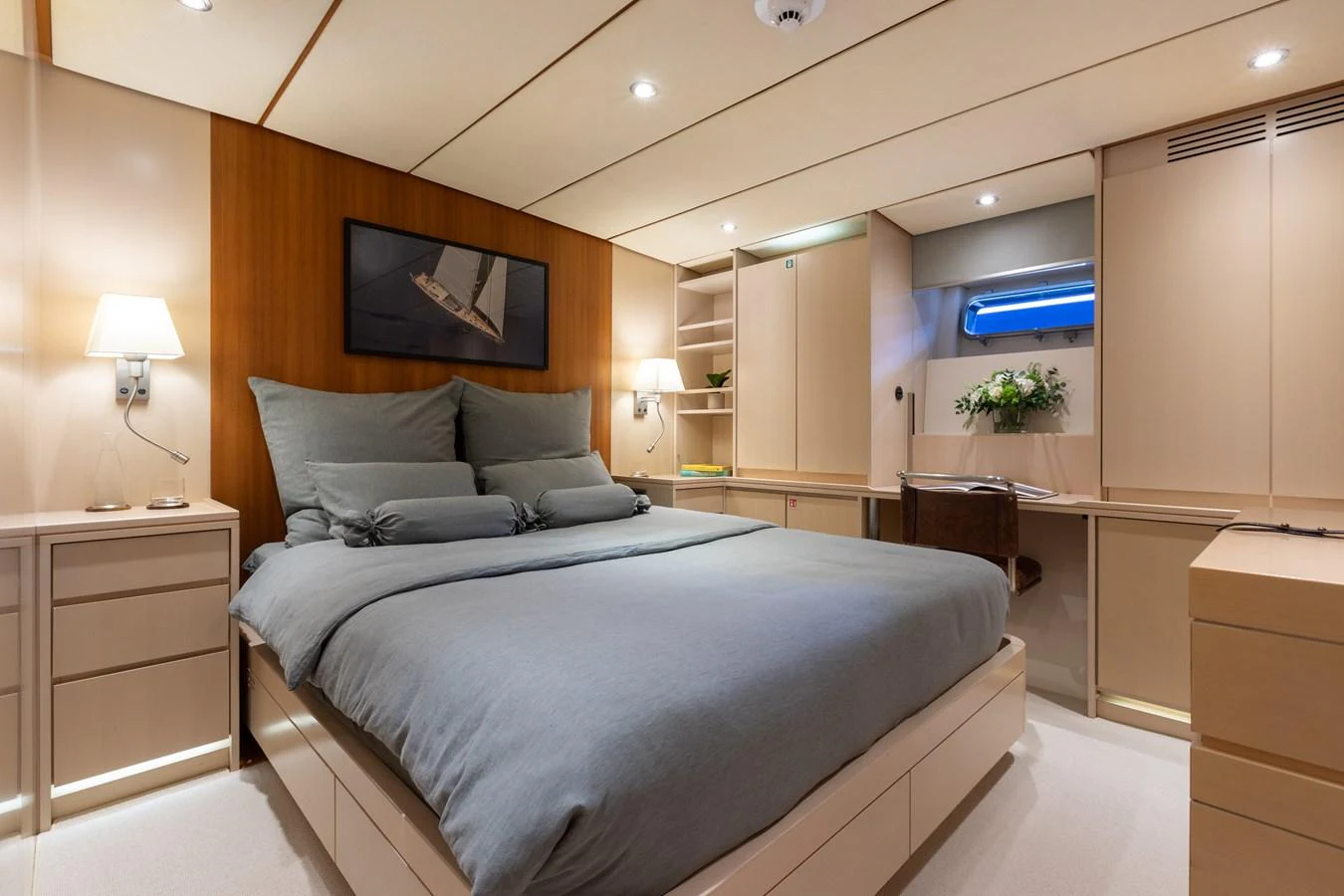 The stateroom features a comfortable bed with elegant bedding and ample storage space, creating a cozy and inviting atmosphere. aboard 4K Yacht for Sale