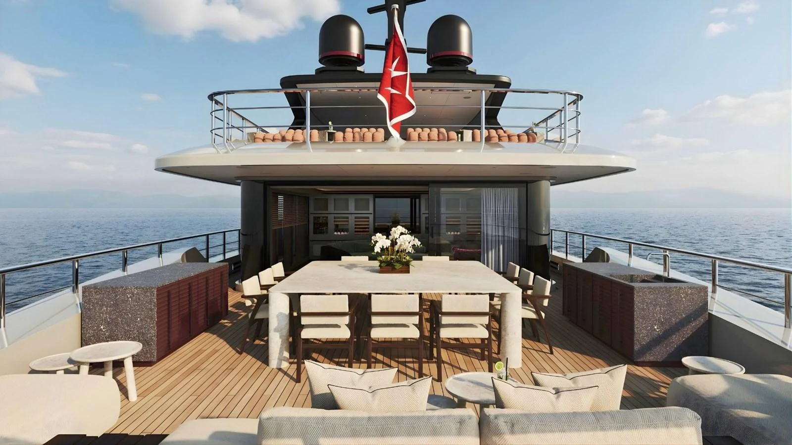 The aft deck features a spacious dining area with elegant seating and a stunning ocean view. aboard CASA F Yacht for Sale