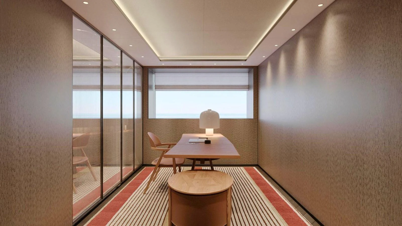 A sleek and modern office space on the yacht, featuring a large window with a view of the sea. aboard CASA F Yacht for Sale