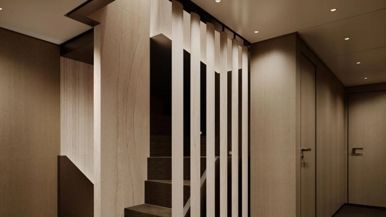 A modern and elegant staircase with sleek wooden finishes and vertical slats. aboard CASA F Yacht for Sale