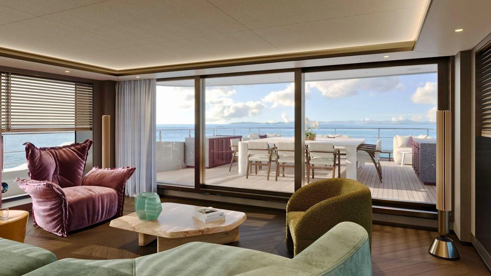The salon offers a luxurious and spacious area with large windows providing a stunning view of the ocean. aboard CASA F Yacht for Sale
