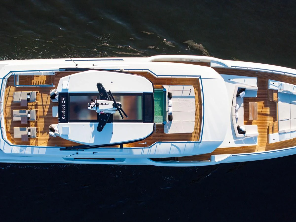 A stunning aerial view of a sleek and modern yacht cruising on the water. aboard BAGLIETTO DOM 133 #5 Yacht for Sale