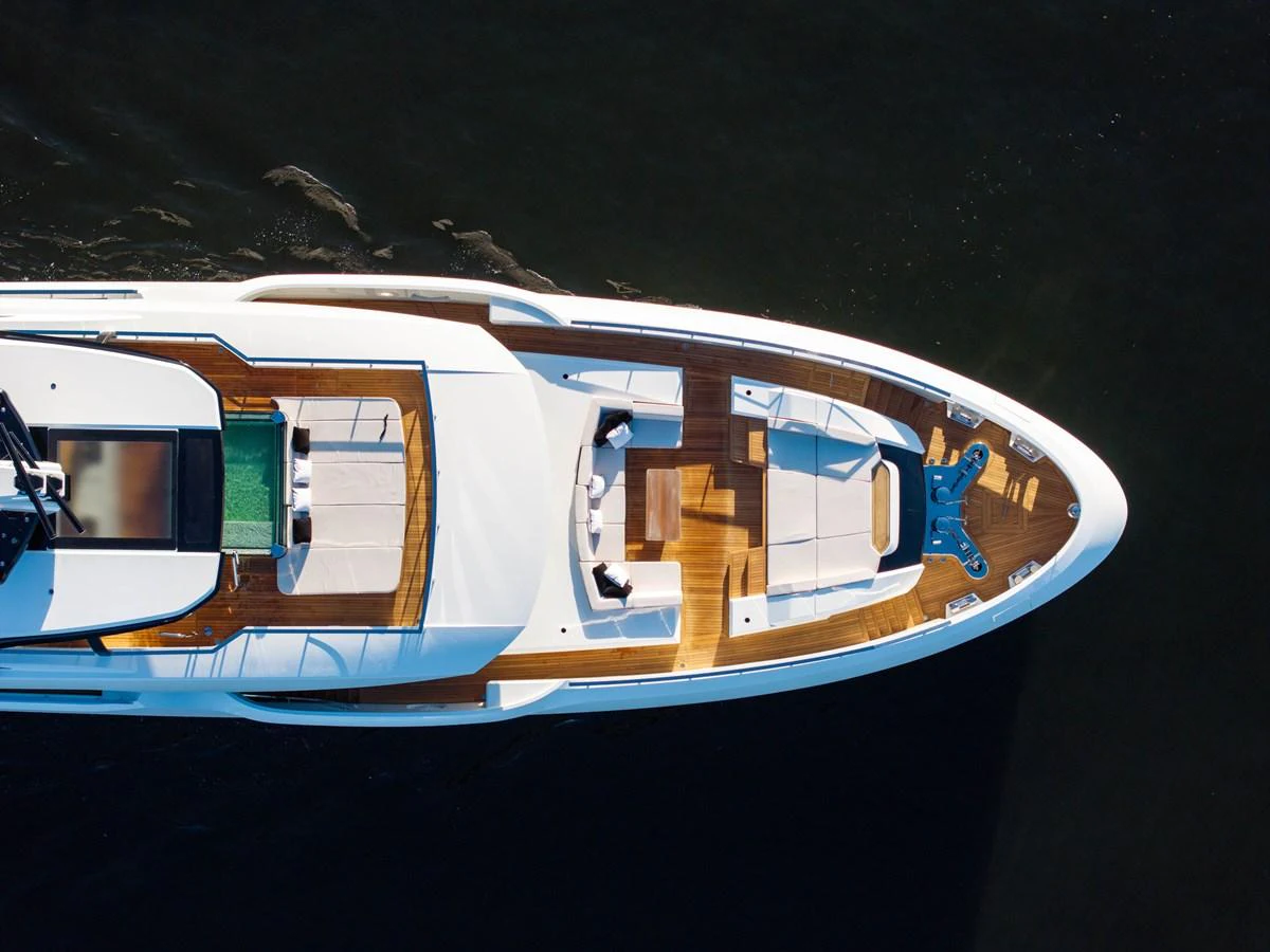 An aerial view of the yacht's sundeck showcasing luxurious lounging areas and sleek design. aboard BAGLIETTO DOM 133 #5 Yacht for Sale