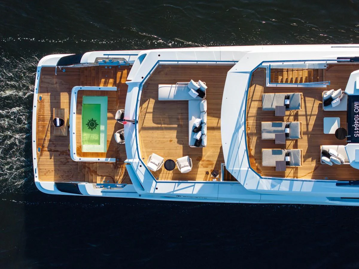 The yacht's sundeck features a luxurious pool and ample lounging areas, perfect for relaxation and entertainment. aboard BAGLIETTO DOM 133 #5 Yacht for Sale