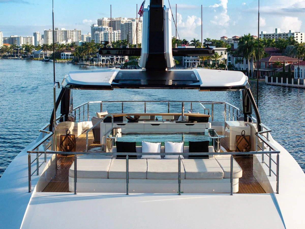 The yacht's flybridge offers a luxurious outdoor seating area with stunning views of the surrounding waterfront. aboard BAGLIETTO DOM 133 #5 Yacht for Sale