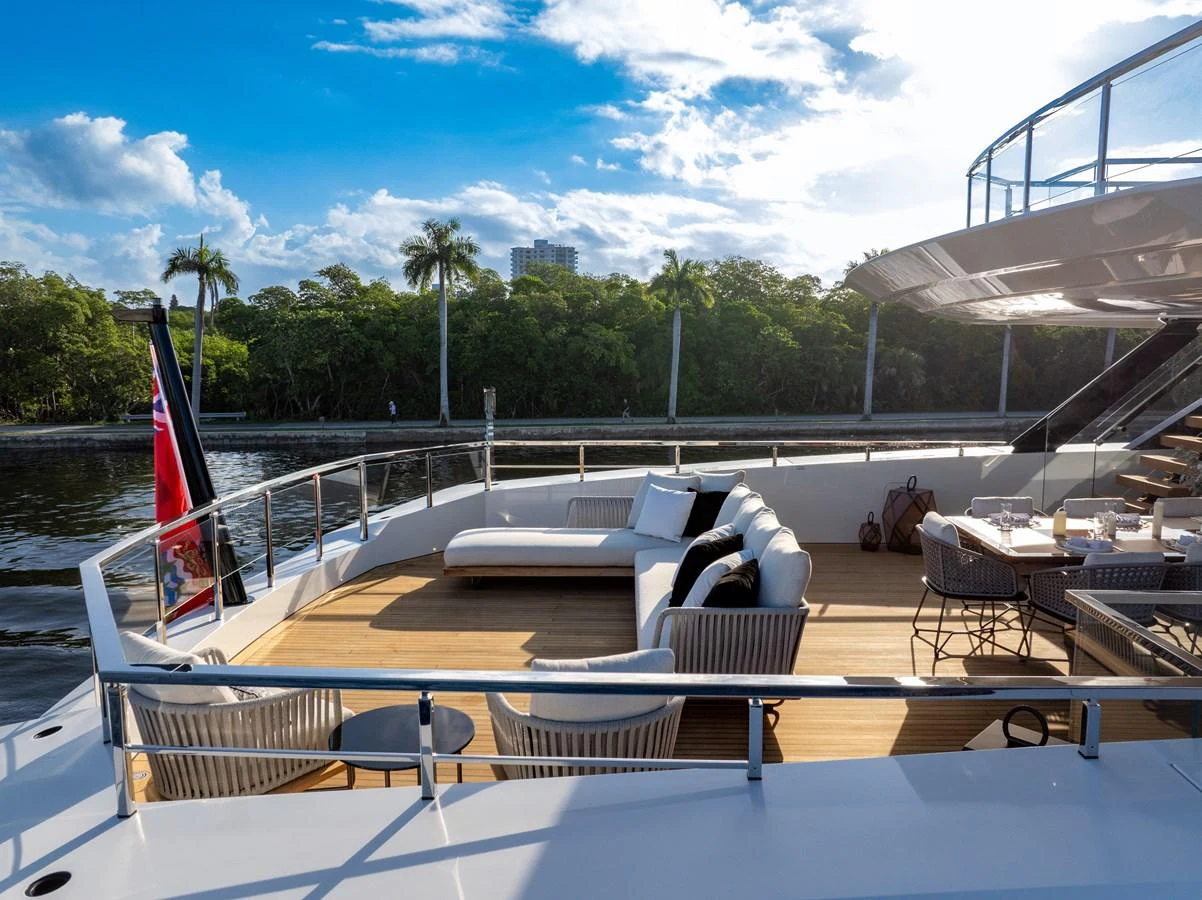 The aft deck offers a spacious and inviting area for relaxation and dining with scenic views. aboard BAGLIETTO DOM 133 #5 Yacht for Sale