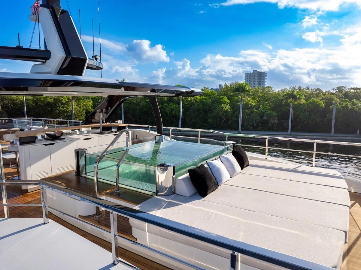 The sundeck features a luxurious jacuzzi and sun loungers, perfect for relaxation. aboard BAGLIETTO DOM 133 #5 Yacht for Sale