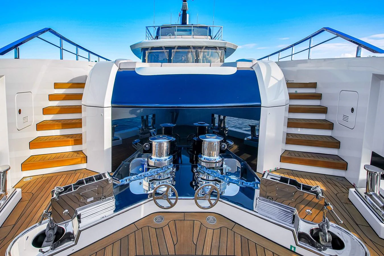 The yacht's bow features polished anchor winches and a spacious deck area. aboard BAGLIETTO DOM 133 #5 Yacht for Sale
