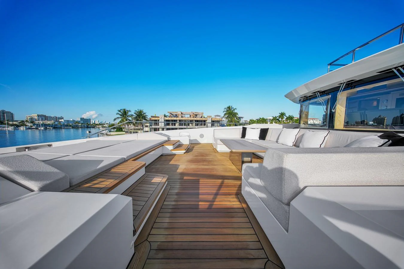 The aft deck offers a spacious and luxurious outdoor lounging area with plush seating and stunning views. aboard BAGLIETTO DOM 133 #5 Yacht for Sale